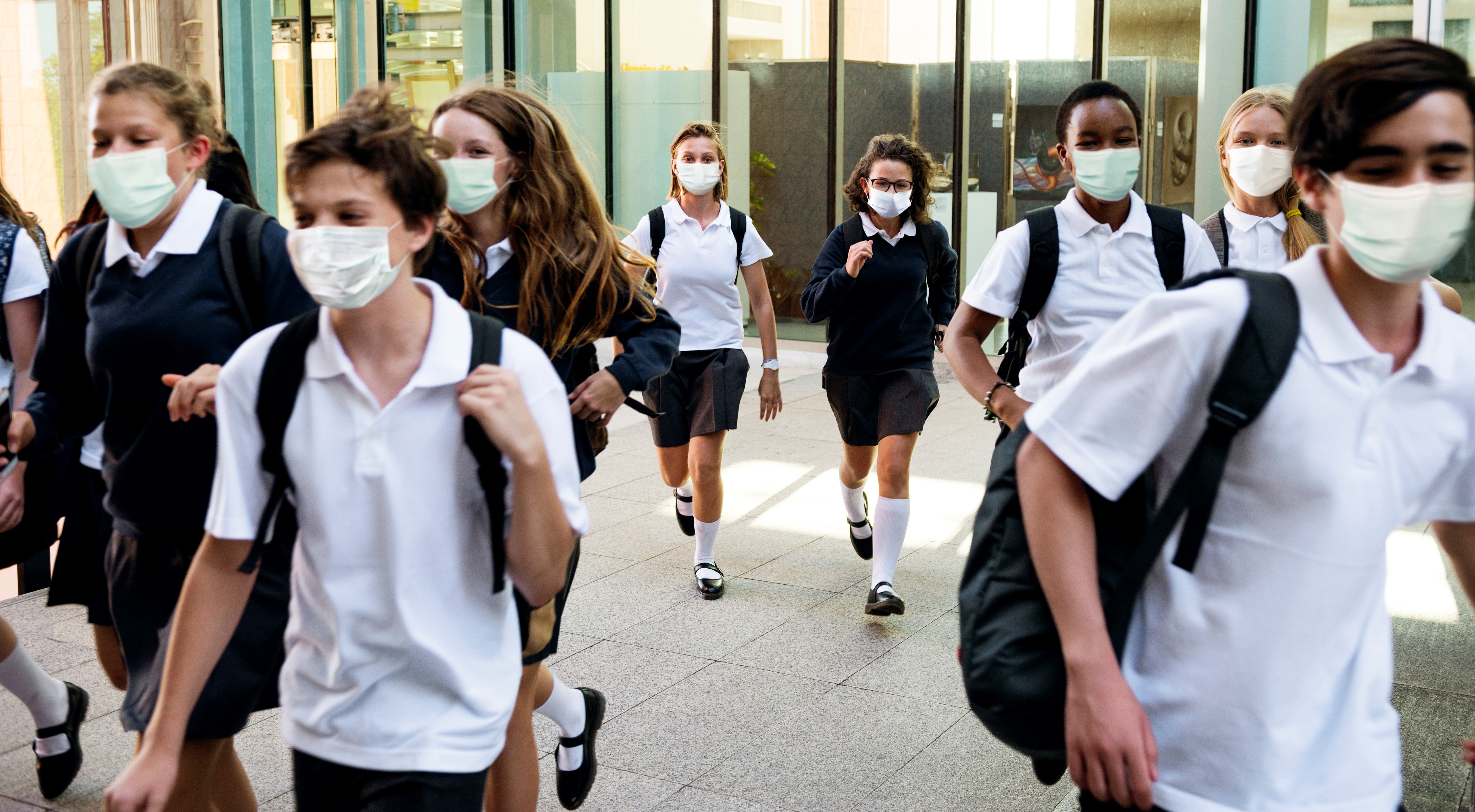 high-school-students-wearing-masks-their-way-home
